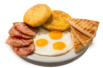 Breakfast with Fried Egg, Toast and Cutlets on the Plate -