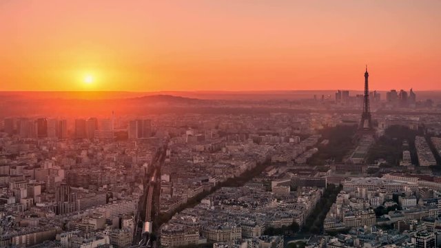 Panoramic view of Paris at sunset. Drone lapse video.