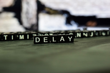 Delay on wooden blocks. Cross processed image with bokeh background