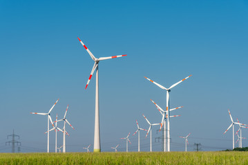 Wind energy generators on a sunny day seen in Germany