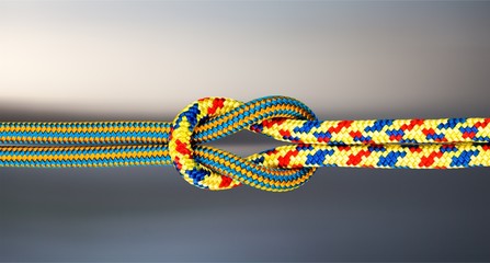 Knot on a cord close up on