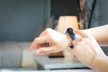 smart band, women touching fitness smart band on her hand