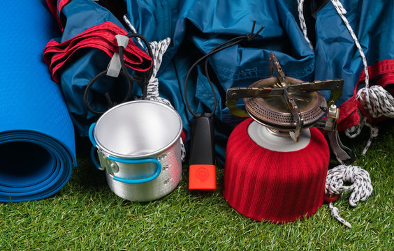 things for camping in the forest lie on the green grass