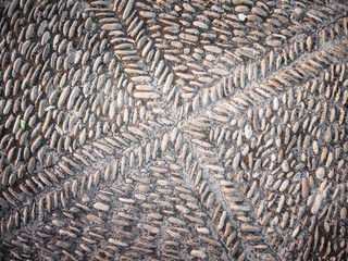 rustic pavement built with metamorphic stones called river ridges