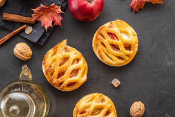 Homemade Apple pie or tart on autumn background. Autumn concept. Copy space.