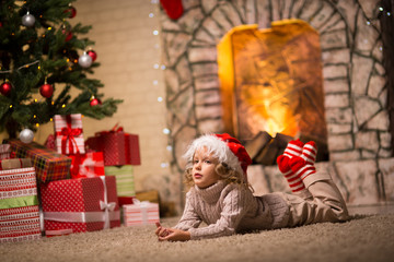 Baby girl in christmas interior
