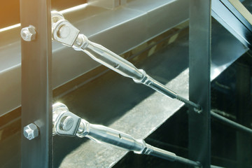 Closeup of Metal Hardware Parts of Stair Cable Railing System