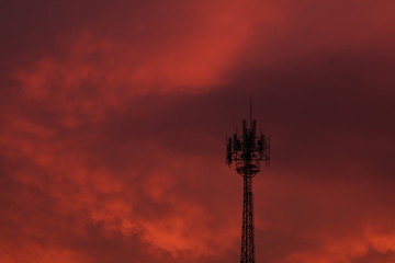 red sky at night and antenna