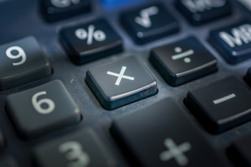 Obraz premium multiply button on a calculator