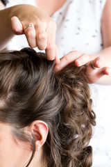 Naklejka premium Hand of a hairstylist