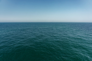 open deep sea and clear blue sky