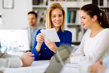 Beautiful businesswomen working in office