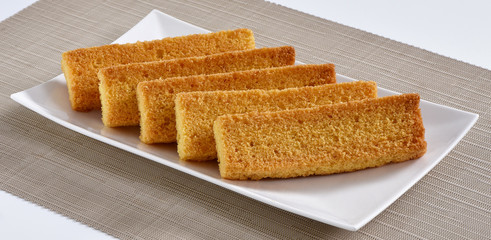 Cake Rusk, Crunchy, crispy dry cake biscuit, also known as cake toast.  