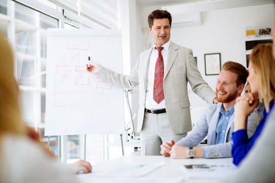 Group of business people working as team in office