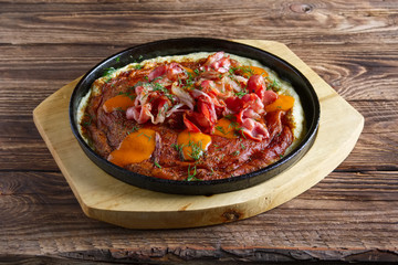 Omelette with bacon. Rural breakfast.