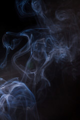 Smoke on a black background.