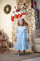 Baby girl in christmas interior