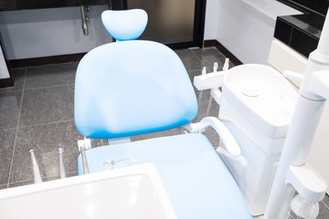 Dental chair and other accesries used by dentists in the office.