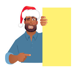 African man in hat holding blank banner.