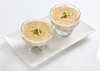 Vermicelli / Sawaiyan, A thin golden spaghetti type pasta sweet dish serve with condense milk and in sugar syrup.