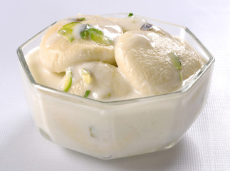 Rasmali, A sweet, yummy & cold dessert,  with cottage cheese dumpling dip in thickened cold milk.