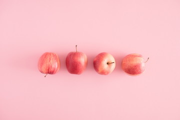 Autumn composition. Apples on pastel pink background. Autumn, fall creative concept. Flat lay, top view, copy space  © prime1001