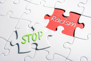 The Words Stop And Racism In Missing Piece Jigsaw Puzzle