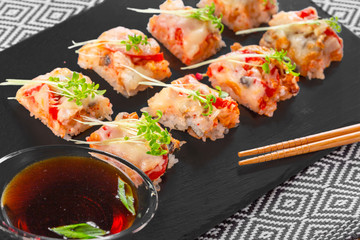 fresh sushi on rustic wooden table