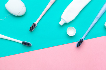 Flat lay composition with manual toothbrushes on color background, close up