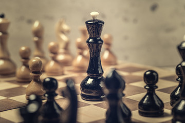 chess pieces on the board in blur selective focus