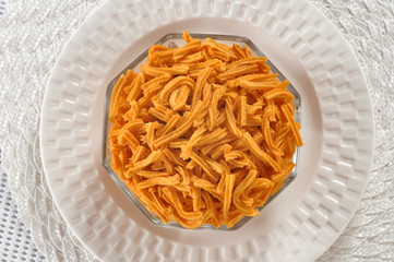 Sev (Punjabi), A Crunchy noodles type spicy snack made from gram flour paste,