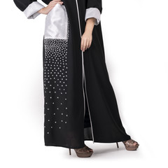 arabic muslim woman in stylish abaya, in white background