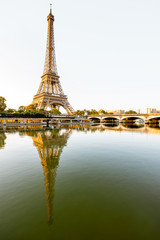 Obraz na płótnie Canvas Landscape view of the riverside with Eiffel tower during the morning light in Paris