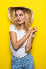 Carefree summer. Beautiful summer girl in on yellow background.