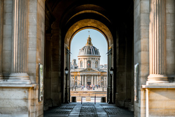 Fototapeta na wymiar View through the arch on Institute of France building in Paris