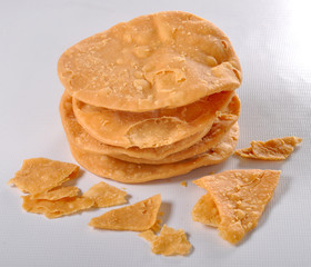 Papri, a crispy fried dough wafers used especially with chana chaat and dahi bhalle
