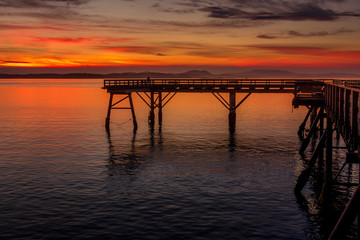 Pier surrounded by sea and color