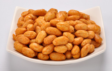 Spicy Peanuts prepared with red chilli powder, heat & salt  gives you extra heat and energy to your body