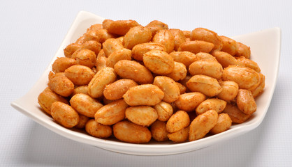 Spicy Peanuts prepared with red chilli powder, heat & salt  gives you extra heat and energy to your body