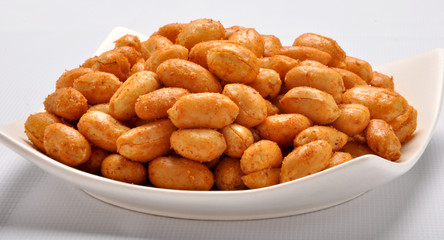 Spicy Peanuts prepared with red chilli powder, heat & salt  gives you extra heat and energy to your body