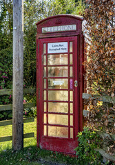A red telephone box in Settrington village in East Yorkshire