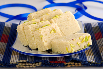Barfi popular sweet mithai made with condense milk, sugar & cardamom
