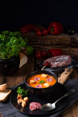 Hungarian paprika cream soup with spicy sausage