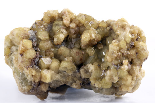 Macro shooting of natural mineral rock specimen - raw crystals of spessartine garnet gemstone