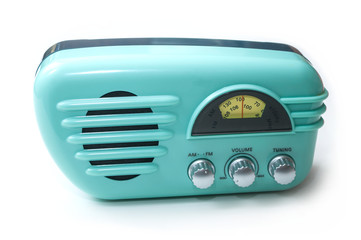 closeup of vintage fifties style radio on white background