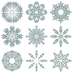 Collection of artistic icy abstract crystal snow flakes isolated on background as winter december decoration group or collection. Ice or frost beautiful star ornament silhouette or season art