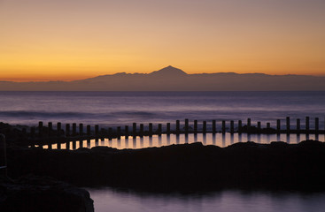 Obraz premium Sunset over natural swimming pools