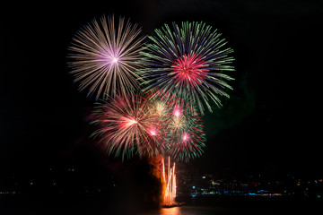 Beautiful colorful fireworks at night for celebration and anniversary or New year holiday concept