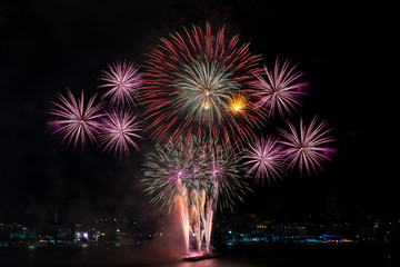 Beautiful colorful fireworks at night for celebration and anniversary or New year holiday concept