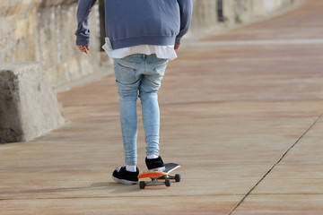 teenager skating on the street